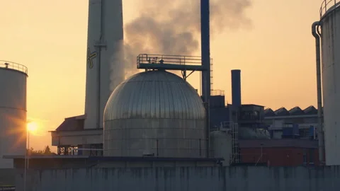 Industrial complex, chimneys in the sunset with smoke, pollution.  Stock Footage 143232757