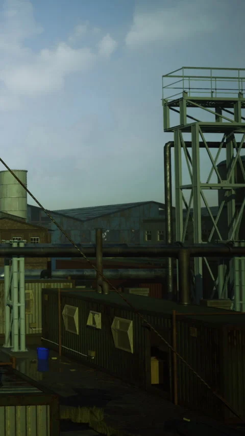 Industrial complex at dusk with tall chimneys and clouds in the sky Stock Footage 334201457