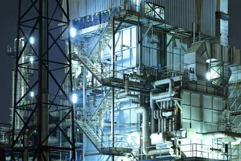 Industrial complex at night Stock Photos