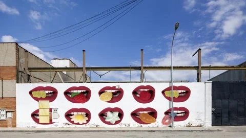 Industrial complex overlayed with red lips visuals on the brick wall Vídeos de archivo 316184539
