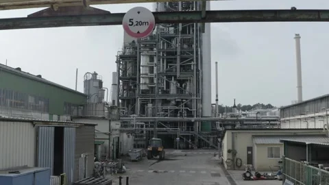 Industrial complex view under pipe structure, France Stock Footage 310190336