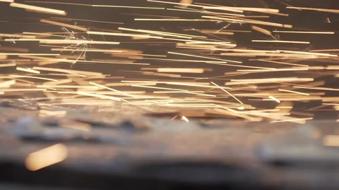 Industrial concept grinding metal with sharp sparks. Grinding smooths steel and 스톡 동영상 130714298