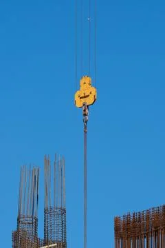 Industrial Construction Crane Hook on a Clear Blue Sky Background Stock Photos
