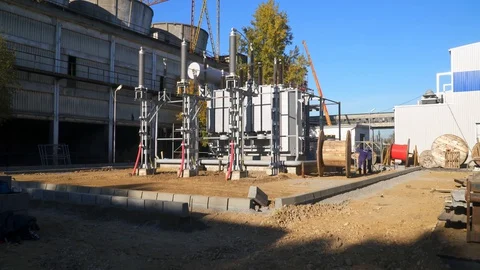 Industrial Construction Workers in Background Exterior Sunny Day Stock-Footage 128486583