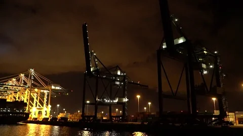 Industrial Container Cargo freight ship with working crane bridge in shipyard Stock Footage 75579423