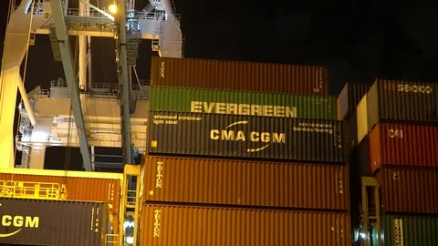 Industrial Container Cargo freight ship with working crane bridge in shipyard Stock Footage 75582358