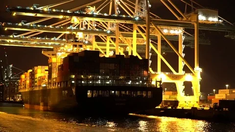 Industrial Container Cargo freight ship with working crane bridge in shipyard Video stock 75582661
