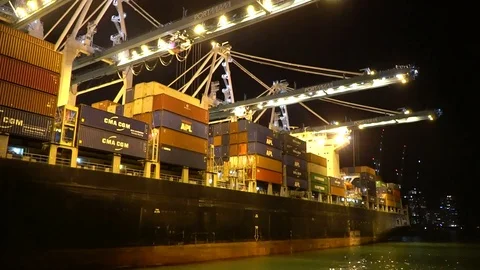 Industrial Container Cargo freight ship with working crane bridge in shipyard Stock Footage 75583071