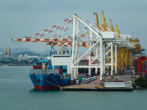 Industrial Container Cargo Ship Loading At Busy Port High Angle Shot Stock-Fotos