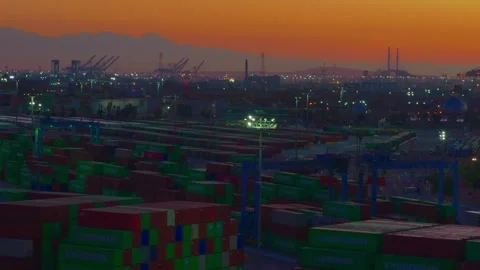 Industrial container terminal cargo yard at sunset with crane harbor Vídeos de archivo 334772910