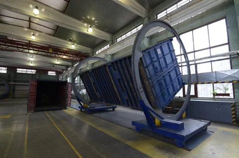 Industrial container tilter machine rotating cargo container inside repair .. Stock Photos