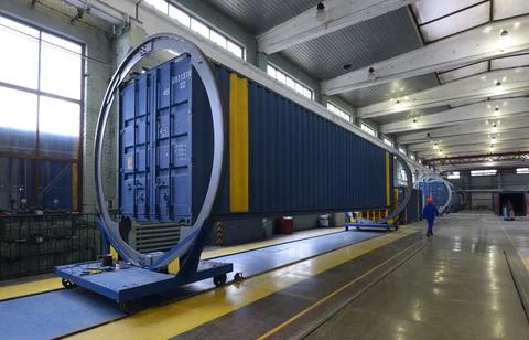 Industrial container tilter machine rotating cargo container inside repair .. Stock Photos