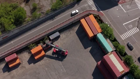 Industrial Container Yard and Heavy Equipment Operating in Milan Logistics Area Stock Footage 343549598