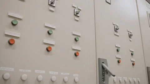 Industrial Control Panel with Buttons and Switches in Indoor Setting Stock Footage 316594936