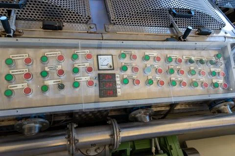 Industrial control panel with buttons at olive oil processing plant Stock Photos