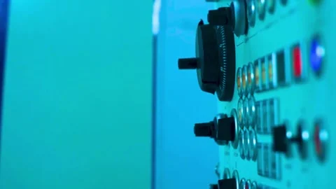 Industrial control panel with dials and buttons in blue laboratory Stock-Footage 342905401