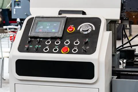 Industrial control panel with touchscreen display and toggle switches, feat.. Stock Photos