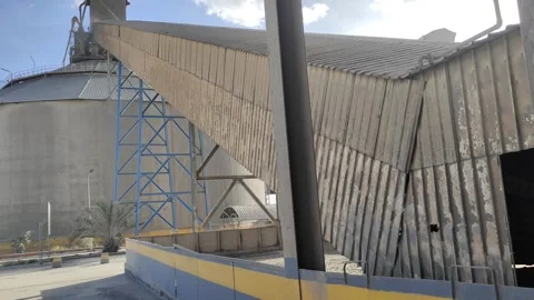 Industrial Conveyor System Transporting Clinker to Storage Silos 4K Stock Footage 333341169