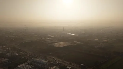 A industrial corridor featuring extensive solar power installations on factory Stockbeeldmateriaal 334194489