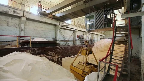 Industrial crane, gantry crane, rail crane moves raw materials in the enterprise Stock Footage
