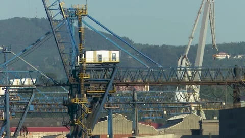 Industrial cranes and structures at bilbao port steelworks 動画素材 334188971