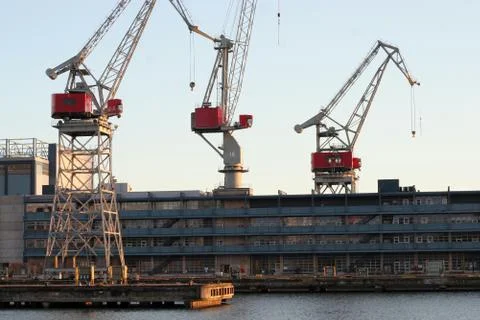 Industrial cranes in the port Stock Photos