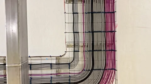 Industrial data center corridor with power cables and technical systems Stock Footage 332044065