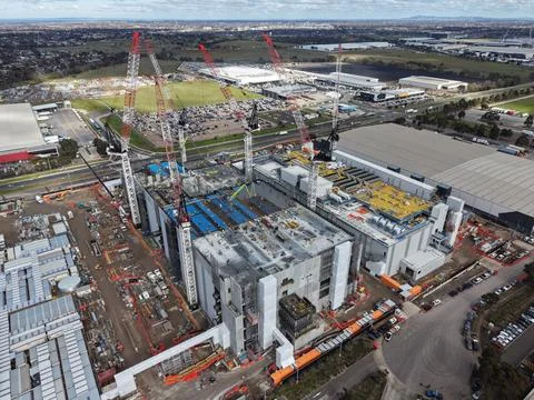 Industrial data centre building construction site with multiple cranes Stock Photos