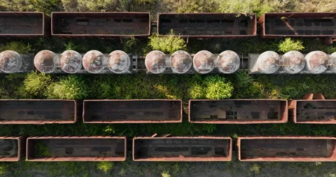 Industrial decline captured through rusted train cars Stock Footage 301880761