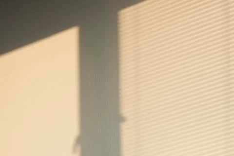 Industrial design window sunlight parallel lines shadows. Light and shadow from Fotos Stock