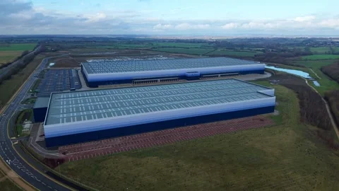 Industrial distribution centres and loading bays, HGV logistics and industry UK Stockbeeldmateriaal 327724178