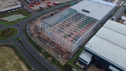 Industrial distribution centres and loading bays, HGV logistics and industry UK Stockbeeldmateriaal 327726421