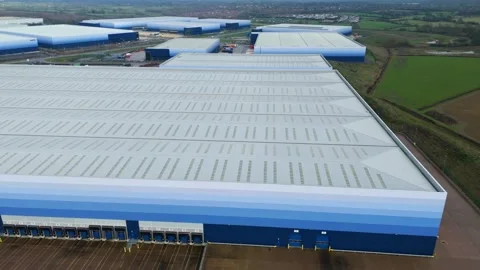 Industrial distribution centres and loading bays, HGV logistics and industry UK Video stock 327726534