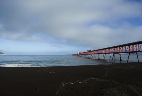 An industrial dock for deep-draft vessels on the coast of Chile Stock Photos