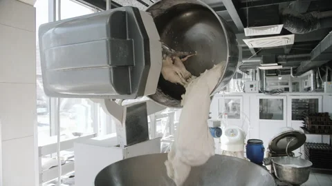 Industrial Dough Mixer Processing Dough in Bakery Stock Footage 321414578