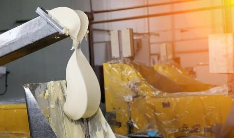 Industrial dough processing at a manufacturing facility Stock Photos