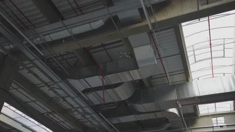 Industrial drone flying inside modern factory building roof inspecting air .. Stock Footage 337404340