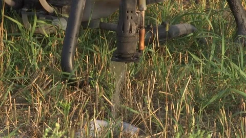 An industrial drone on greenfield. Video stock 296086970