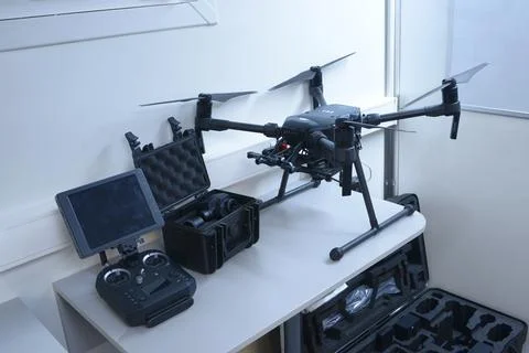 Industrial drone, remote control, camera and box ready to use Stock Photos