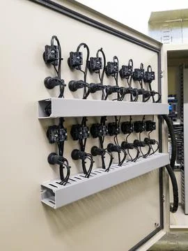 Industrial electrical control panel with switches and wiring system Stock Photos