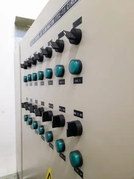 Industrial electrical control panel with switches and wiring system Stock Photos