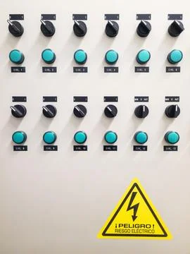 Industrial electrical control panel with switches and wiring system Stock Photos