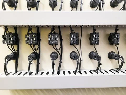 Industrial electrical control panel with switches and wiring system Stock Photos