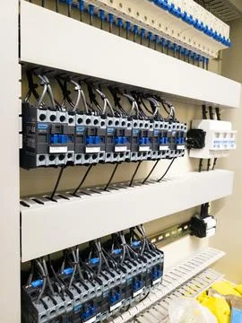 Industrial electrical control panel with wiring and circuit breakers Foto stock