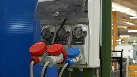 Industrial electrical power distribution panel and heavy duty plugs in plant Stock Footage 328644897