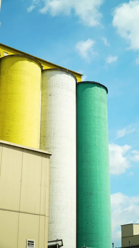 Industrial elevators at the factory against the sky Stock Footage 312744989