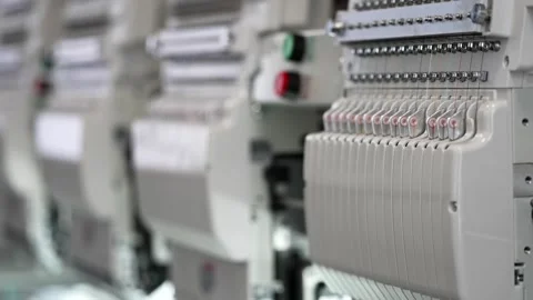 Industrial embroidery machine operating with multiple threads in textile ma.. Stock Footage 337282338