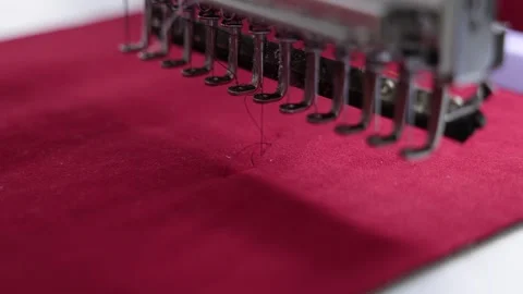 Industrial Embroidery Machine Stitching Red Fabric Stock Footage 340381792