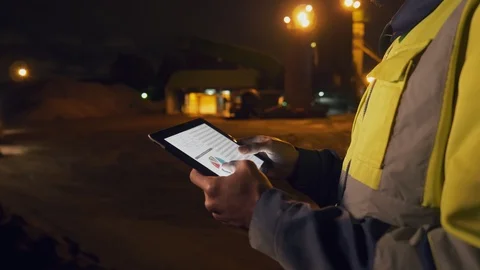 Industrial engineer controlling supply loading and delivery with tablet working Video stock 124304013