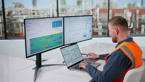 Industrial Engineer Monitors Computer System Controlling Automated Gas Stock Footage 330582268